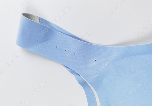 Perforation laser pour brassière de sport